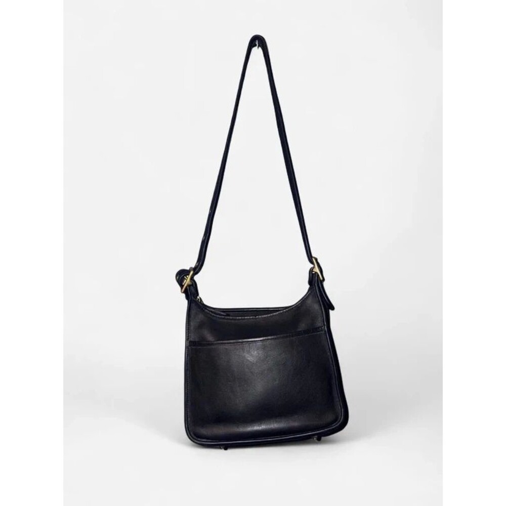 Vintage Coach Legacy Zip Bag in black leather with brass hardware